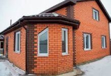 Плюсы и минусы облицовки фасада дома под кирпич