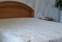 Какую деревянную кровать из массива выбрать